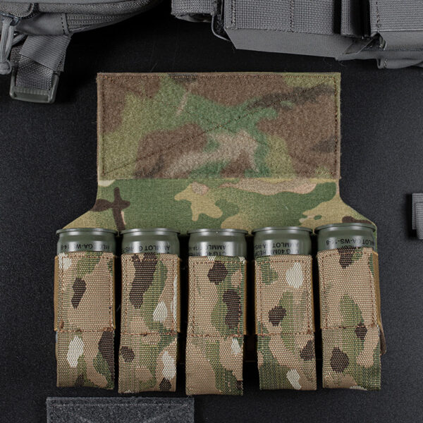 Tactical chest vest with multi-functional storage for lower abdomen bag. Five-piece M203 camouflage replenishment pack.